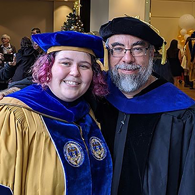 Andrea Welsh and Flavio Fenton of the School of Physics.