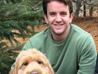 Peter Addison, fourth-year undergraduate and May 2020 candidate for graduation from the School of Physics, and Lucy, the family goldendoodle. 